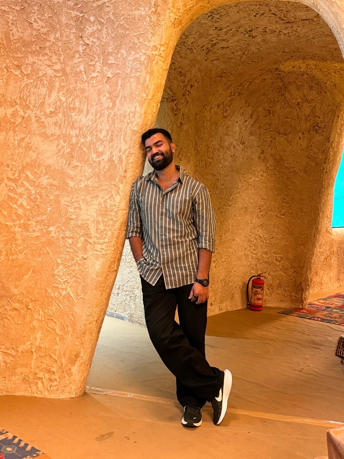 Rishav in a desert arch