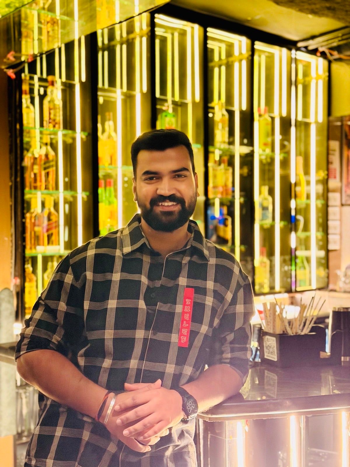 Rishav under neon light
